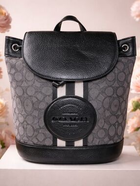 Coach Dempsey Drawstring Backpack in Signature Jacquard with a leather patch